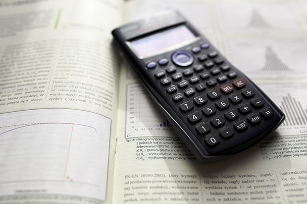 Calculator over a math textbook